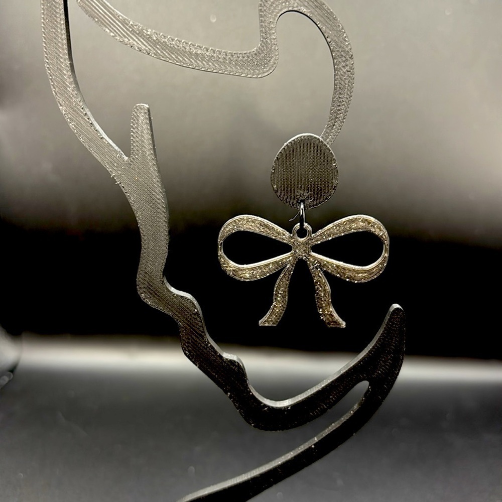 Elegant Black Glitter Bow Earrings - Picture 3 of 4